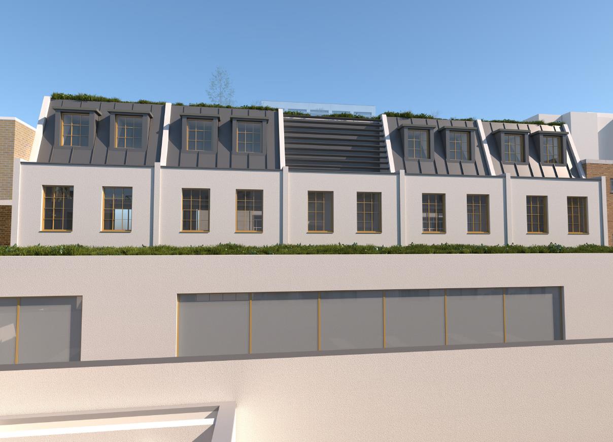 Rear facade — mansard dormers over rendered upper floors